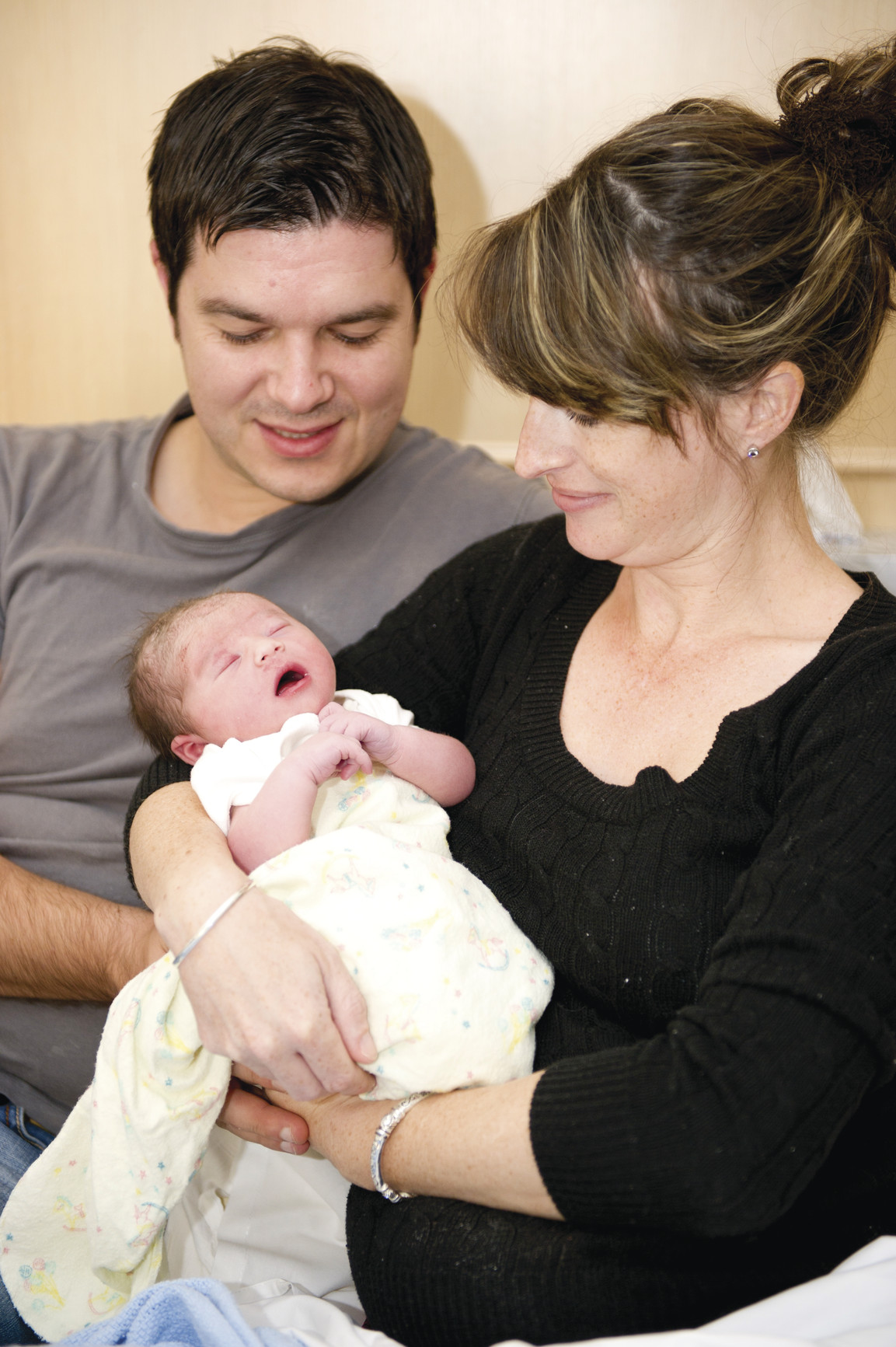 Parents and newborn baby